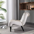 Poltrona in velluto con gambe in legno