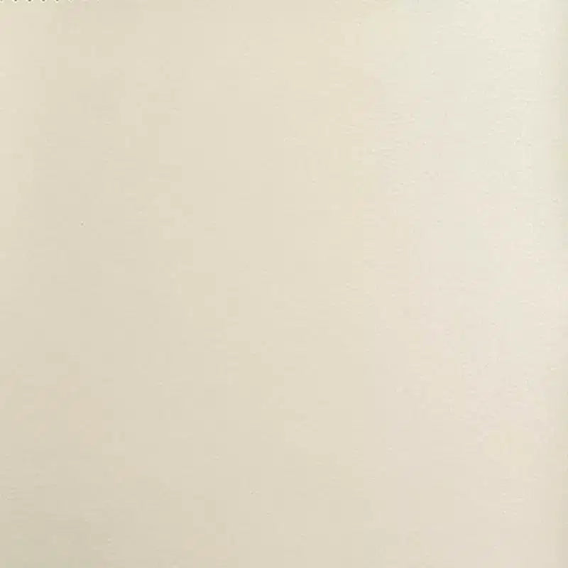 Poltrona reclinabile a pozzetto in similpelle color crema con reclinazione manuale, seduta imbottita e tasca laterale